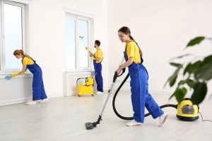 A team of professional cleaners thoroughly cleans the room, demonstrating what is post renovation cleaning entails.