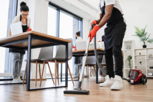 Professional holiday cleaning services team working in the office for preparing a business for the rush.